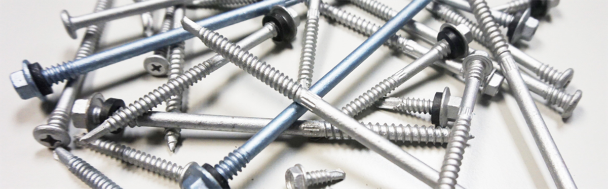 Collection of metal and timber roofing fatseners together with wafer screws